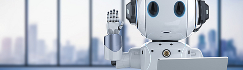 Lächelnder und winkender Roboter mit einem Laptop