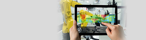 Ein Roboter wird über ein Tablet bedient