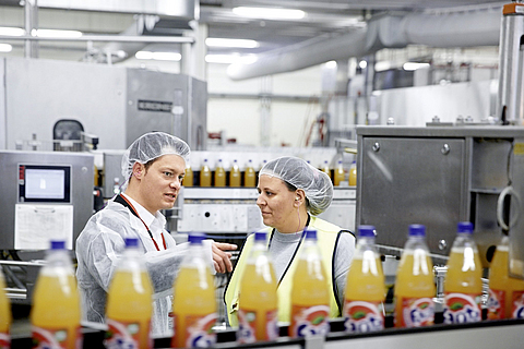 Sicherheitsgespräch zwischen Mitarbeiterin und Sicherheitsfachkraft