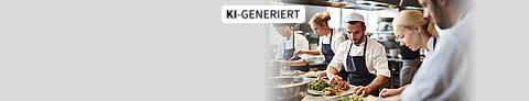 Küchenteam bereitet in der Küche Gerichte zu.