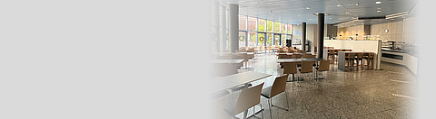 Kantine mit großer Glasfront und Holzboden